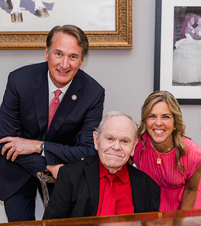 Bob 與州長和第一夫人的合影